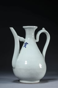 A WHITE-GLAZED 'BIRD-AND-FLOWER' EWER