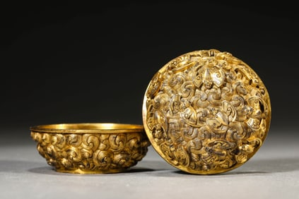 A GILT-BRONZE 'BAT' COVERED BOX