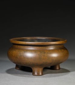 A BRONZE STANDING CENSER