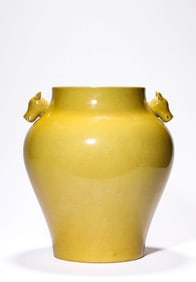 A YELLOW-GLAZED JAR