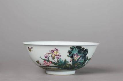 A FAMILLE-ROSE 'BUTTERFLY-AND-FLOWER' BOWL