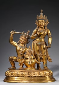 A GILT-BRONZE FIGURE OF BUDDHA