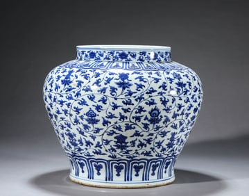 A BLUE AND WHITE 'INTERLOCKING LOTUS AND EIGHT TREASURES' JAR