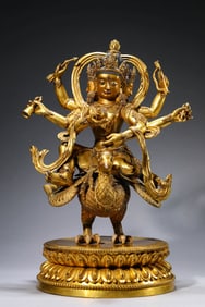 A GILT-BRONZE FIGURE OF PEACOCK-FEATHERED YAMANTAKA