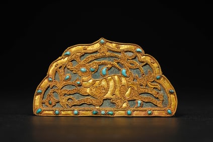 A GOLD ORNAMENT