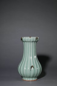 A CELADON GLAZED VASE