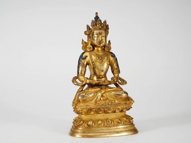 A GILT-BRONZE FIGURE OF AMITAYUS BUDDHA