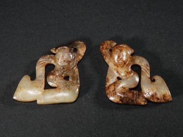 A PAIR OF JADE 'FIGURE' TOMB FIGURES