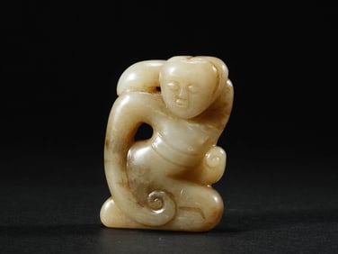 A JADE 'FIGURE' TOMB FIGURE