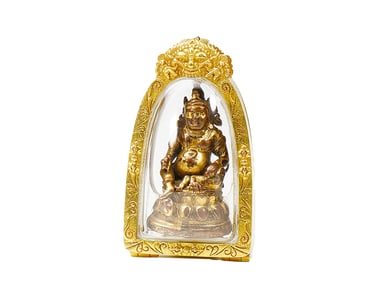 A GILT-BRONZE FIGURE OF THE YELLOW JAMBHALA