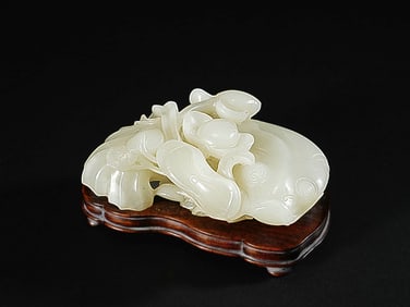A HETIAN JADE 'CATFISH' PENDANT