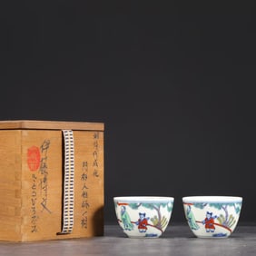 A PAIR OF DOUCAI 'FIGURES' CUPS