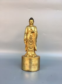 A FINE CRAFTED COPPER STANDING FIGURE OF SAKYAMUNI BUDDHA