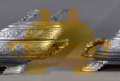 AN GILT-BRONZE TWO-HANDLED JAR