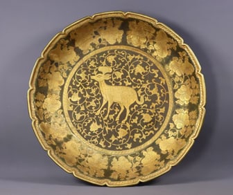 AN HAND-CHASED PARTIALLY GILT 'DEER' TRAY