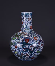A BLUE AND WHITE WITH WUCAI 'DRAGON' GLOBULAR VASE