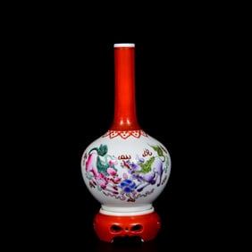 A FAMILLE ROSE 'LION PLAYING WITH BROCADE BALL' REVOLVING VASE