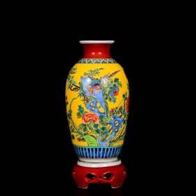 A FAMILLE ROSE 'FLOWERS AND BIRDS' REVOLVING VASE