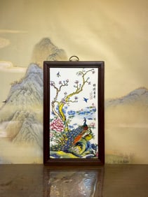 A HONGMU PAINTED AND PORCELAIN-INLAID FAMILLE ROSE 'FLOWERS AND BIRDS' HANGING PANEL