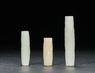 A GROUP OF JADE BEADS