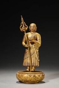 A GILT-BRONZE FIGURE OF KSITIGARBHA