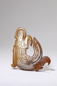 A JADE 'FISH TRANSFORMING INTO DRAGON' PENDANT