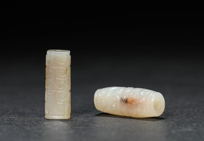 A GROUP OF JADE PENDANTS