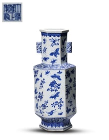 A BLUE AND WHITE 'BUTTERFLY-AND-FLOWER' VASE