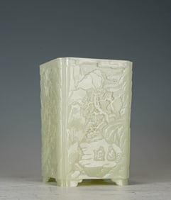 A WHITE JADE 'SCHOLAR-IN-LANDSCAPE' SQUARE BRUSHPOT