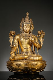 A GILT-BRONZE FIGURE OF WHITE TARA