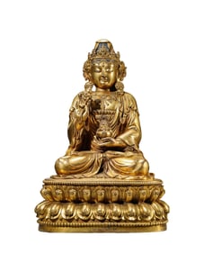 A GILT-BRONZE FIGURE OF BUDDHA