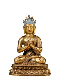 A GILT-BRONZE FIGURE OF BUDDHA