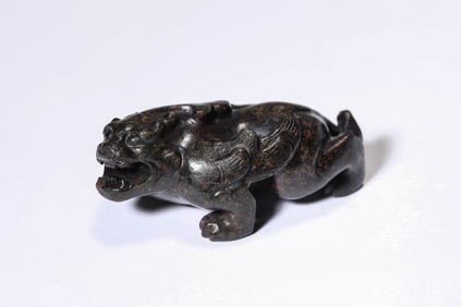 A JADE CARVING OF AUSPICIOUS BEAST