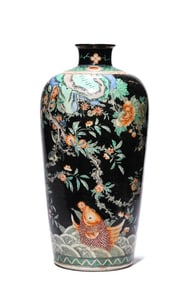 A BLACK-GROUND WUCAI 'FLOWER-AND-BIRD' VASE