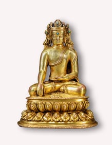 A GILT-BRONZE FIGURE OF BUDDHA