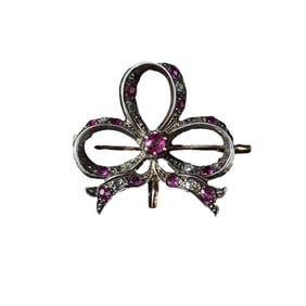 VICTORIAN SILVER-OVER-GOLD DIAMOND AND RUBY BOW BROOCH