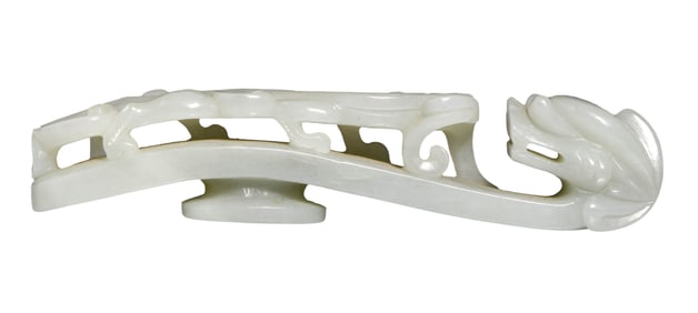 A WHITE JADE 'DRAGON INSTRUCTING OFFSPRING' BELT HOOK