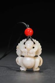 A JADE GARUDA PENDANT