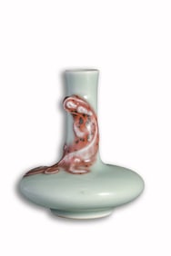 A PALE CELADON-GLAZED APPLIQUE 'DRAGON' VASE