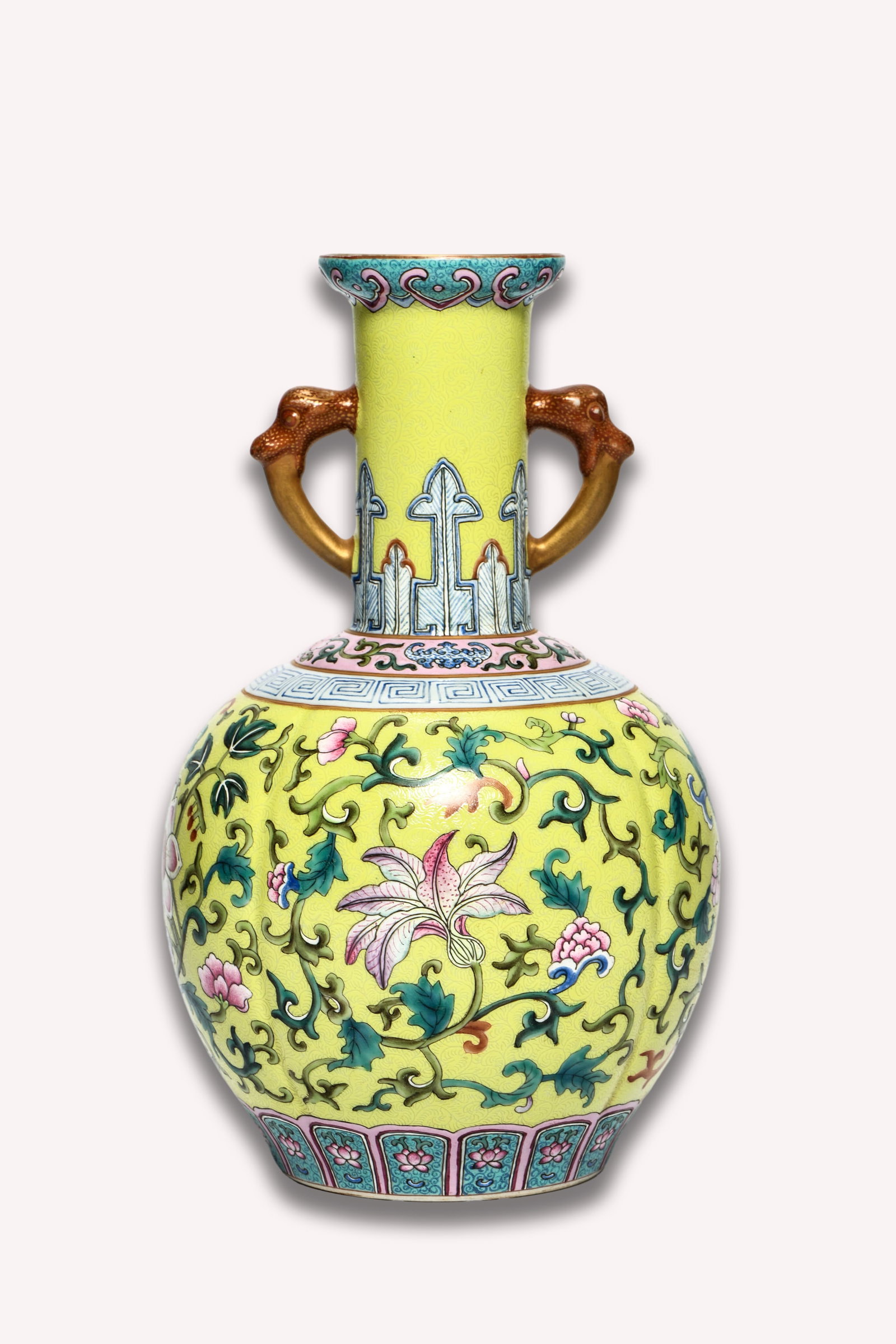 A YELLOW-GROUND FAMILLE ROSE 'INTERLOCKING FLOWERS' VASE (1 of 6)