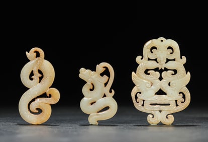 A GROUP OF JADE DRAGONS