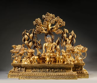 A GILT-BRONZE FIGURE OF SHAKYAMUNI PREACHING