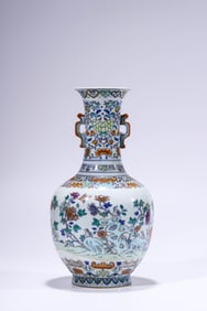 A DOUCAI 'FLOWER-AND-BIRD' VASE