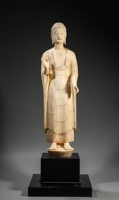 A WHITE MARBLE STANDING FIGURE OF VAIROCANA