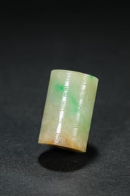 A JADEITE 'POEM' BEAD