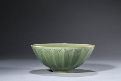 A CELADON LOTUS-PETAL SHAPED BOWL
