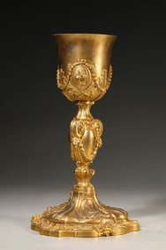 A BRONZE CANDLESTICK