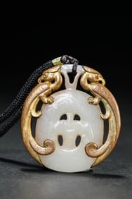 A JADE 'DRAGON-AND-PHOENIX' PENDANT