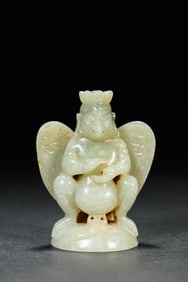 A JADE CARVING OF GARUDA