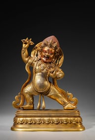 A GILT-BRONZE FIGURE OF MAHAKALA PROTECTOR